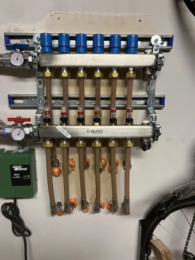 Plumber performing Water Heater Repair at a residential property in Stillwater